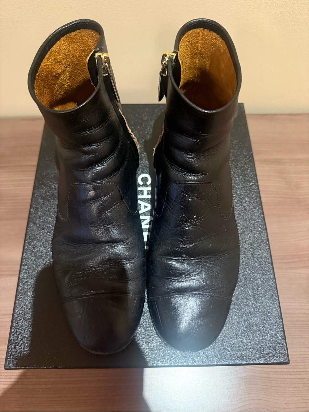 CHANEL Black Leather Ankle Booties with Gold Zippers